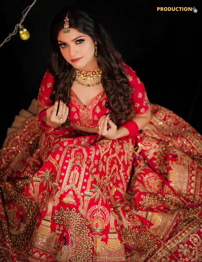 Bridal makeup with traditional red attire and jewelry